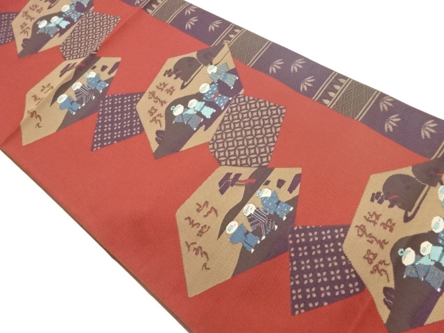 人物に風景・詩模様織出し名古屋帯